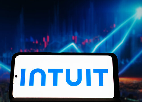 In this photo illustration,  Intuit Inc. logo seen displayed on a smartphone