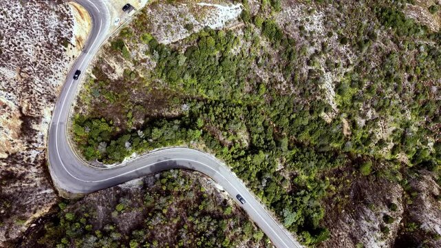 Lookout on Lyell highway miners sign scenic view to Queenstown mining industry town.