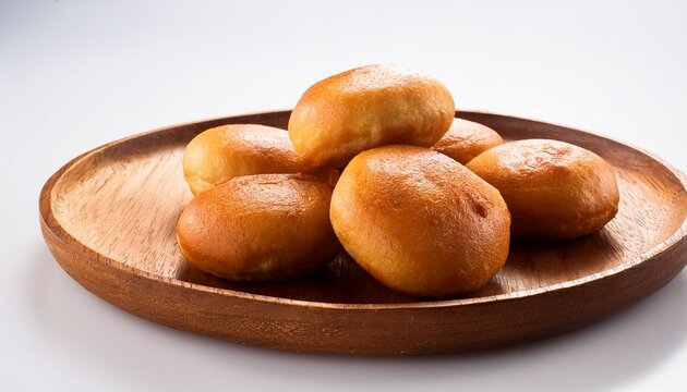 board and plate of tasty bonda with on white background