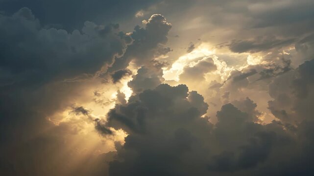 Golden dramatic storm cloud sunlight with radiant rays illuminating sky and warm beams