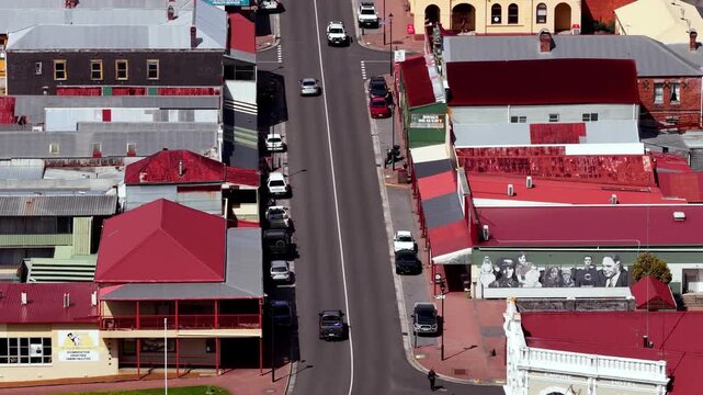 Close aerial view of downtown streets and houses retail of Queenstown in Tasmania.