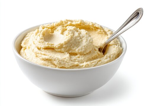 Creamy Hummus Dip in a White Bowl with a Spoon.