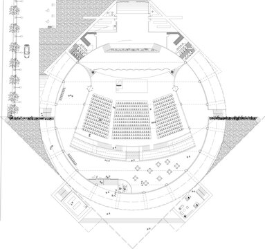Top-down architectural plan of a circular theater with stadium seating, stage, and surrounding lobby. Includes exterior landscaping site plan.