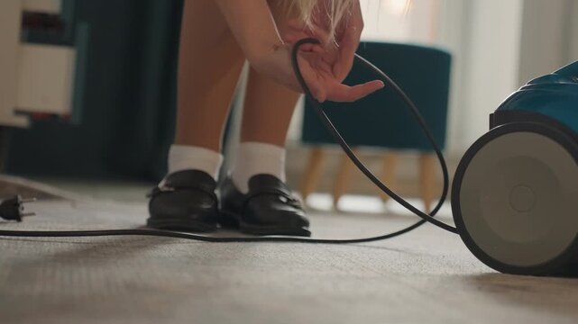 Children are trained to navigate electrical cords securely at home. Young children are instructed on safe handling and management of electrical wires and connections in household environments