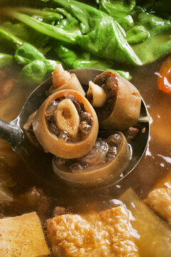 The oxtail soup in the restaurant is a delicious Asian dish.