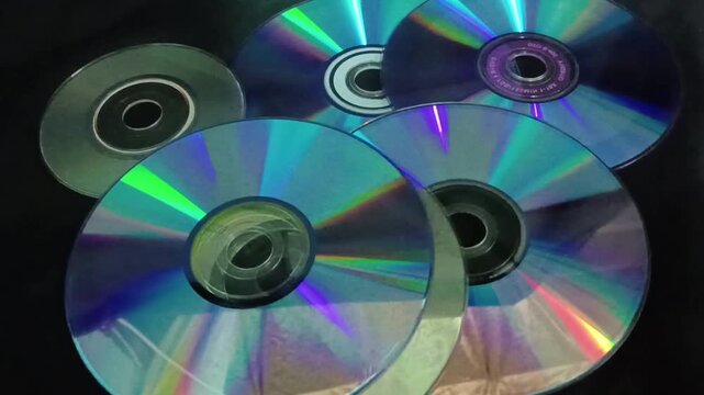 Cd, DVD, CD, DVD, Compact disc on a black background closeup of photo taken in malaysia
