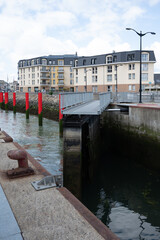 Obraz premium Views of Le Treport, seaside resort in Normandy, France, with white cliffs along English Channel, fishing industry and old buildings, travel destination in France