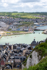 Obraz premium Views from view point on cliffs of Le Treport, seaside resort in Normandy, France, with white cliffs along English Channel, fishing industry and old buildings, travel destination in France