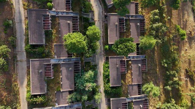 Aerial zenithal view of abandoned houses in Cazalla de la Sierra