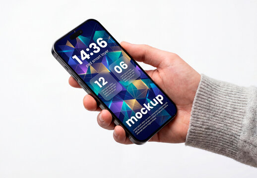 Hand holding smartphone with blank black screen mockup