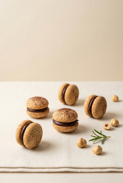 Traditional Baci di Dama, artisanal Italian hazelnut biscuits with chocolate cream, served on a rustic table with espresso. Piedmontese culinary excellence, premium Italian desserts!