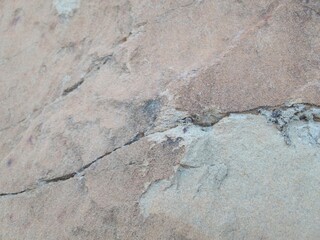 Fototapeta premium Natural Stone Texture Background with Cracks and Rough Surface
