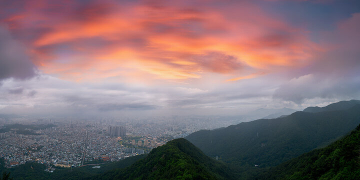 Daegu City sunset skyline, dramatic cloudscape, and Apsan Mountain landscape in Gyeongsangbuk‑do, South Korea