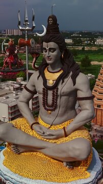 Aerial Drone Shot of Lord Shiva Statue at Char Dham Temple, Vrindavan, Mathura, India
