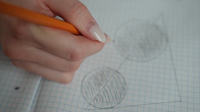Focused learning scene. Closeup of student practicing math with focus and soft lighting. Intimate view of student working diligently on math exercises at home under gentle lighting conditions