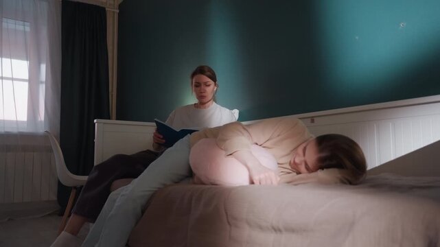White caregiver reading bedtime story to sleeping friend on bed, soft lamp light and curtain shadows, warm comforting voice easing into night, intimate home care moment with gentle reassurance