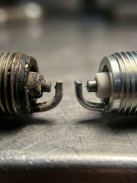 Extreme Macro Comparison of Worn Corroded Spark Plug Electrode Versus New Iridium Electrode Tip