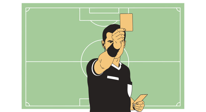 Soccer referee showing yellow card for foul play during match.