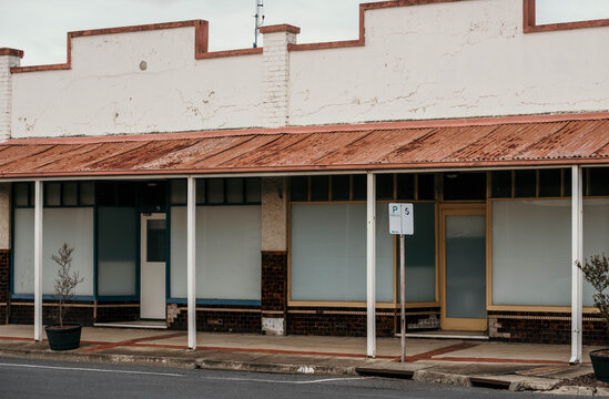 A row of historic shopfronts facing street