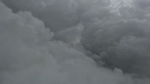 Deep Atmosphere Flight POV Surrounded Entirely By Chaotic Churning Gray And Black Storm Clouds Matrix