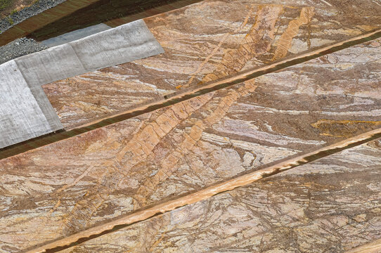 Textures and patterns created by bulldozers earth work on industrial construction site