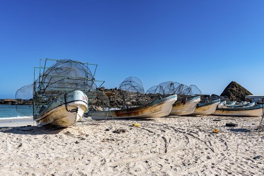 Fishing boats on the Fazayah beach, Salalah, Oman
