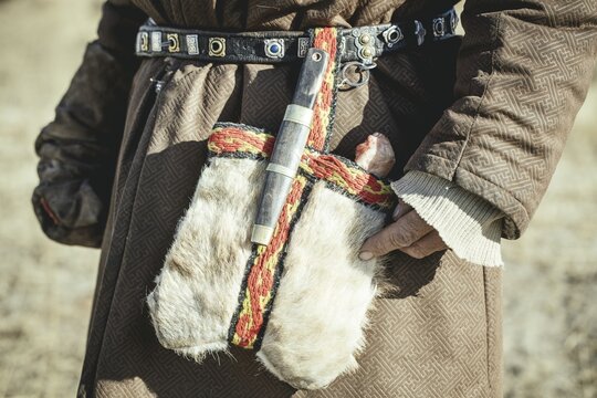 Hunting utensils by eagle hunter Bashakhan Spai, fur bag, Kazakh knife, bones to curl the eagle, Kisil Char, Olgii, Mongolia