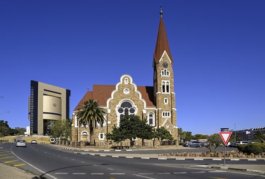 Evangelical Lutheran Christ Church from 1910, in the background the Independence Museum, Windhoek, Khomas region, Namibia