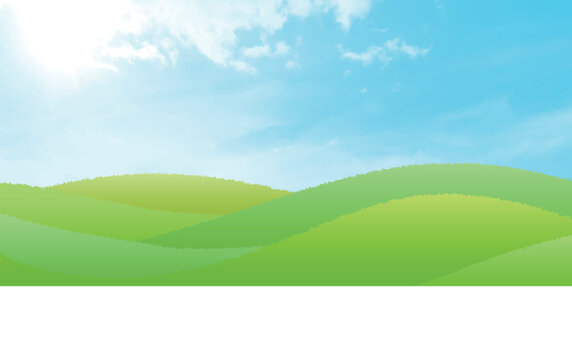 A Peaceful Green Rolling Hill Landscape Under Bright Blue Sky