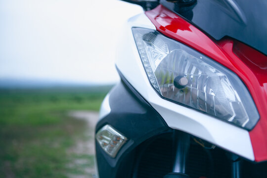 motorcycle on the road in the field. close-up