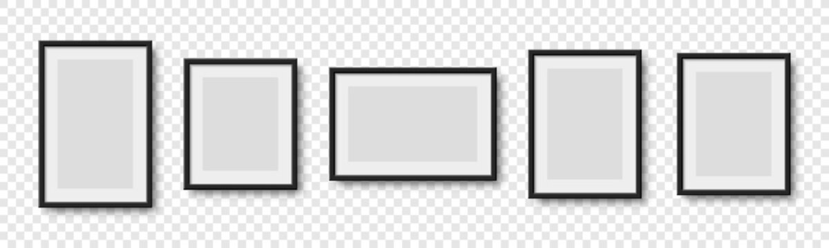 Set of five empty black picture frames with white mats in various orientations including portrait landscape and square with realistic shadows isolated on a transparent background.