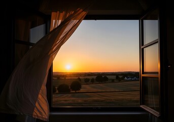 Fototapeta premium Serene countryside sunrise view from a window