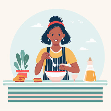 Woman Cooking and Preparing Food in Kitchen