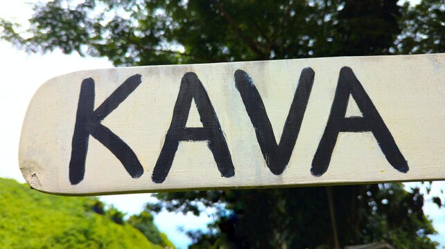 Closeup kava hand painted wooden sign on tropical island in Fiji, South Pacific