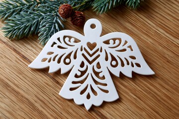 Obraz premium White laser cut angel ornament decorating Christmas holiday