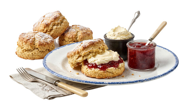 Traditional English scones with clotted cream and strawberry jam