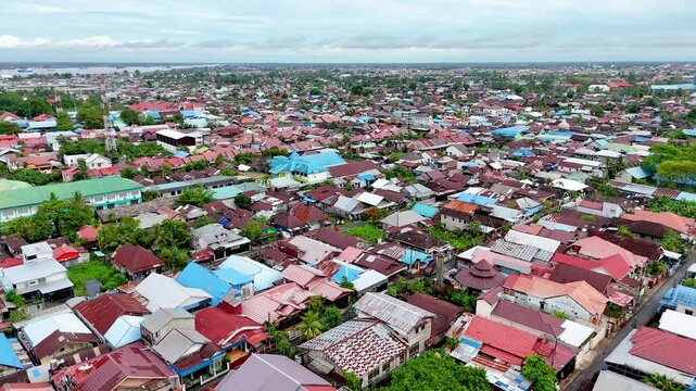 Aerial Drone View of Indonesian Village, Colorful Rooftops, Borneo