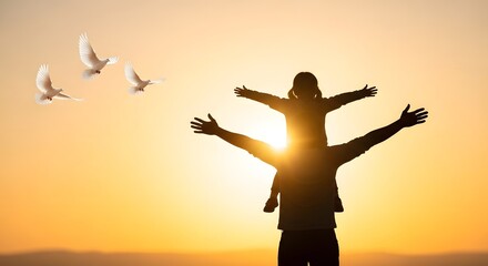 Fototapeta premium Father and child silhouetted against a warm sunset with flying doves International Peace Day