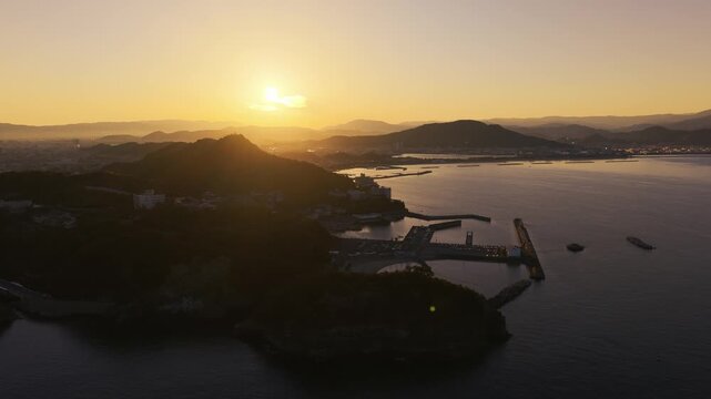 Aerial Side-Flight Shot of Wakanoura Bay at Sunrise &ndash; Japan Heritage Site, Wakayama City, Japan　日本遺産・和歌の浦「朝日に照らされる和歌浦湾の空撮(サイドフライト)」和歌山県和歌山市