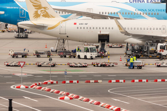 Gulf Air Airbus A320neo Registered A9C-NF Parked Next to China Southern and China Eastern Airliners at Frankfurt Airport