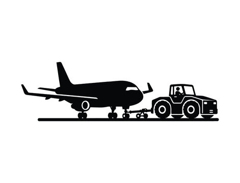 Airplane being towed by a pushback tractor