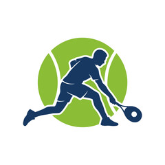 Obraz premium Tennis player in action hits ball with racket on court surface