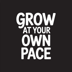 Obraz premium White text GROW AT YOUR OWN PACE phrase on black background with clean typography and motivational concept