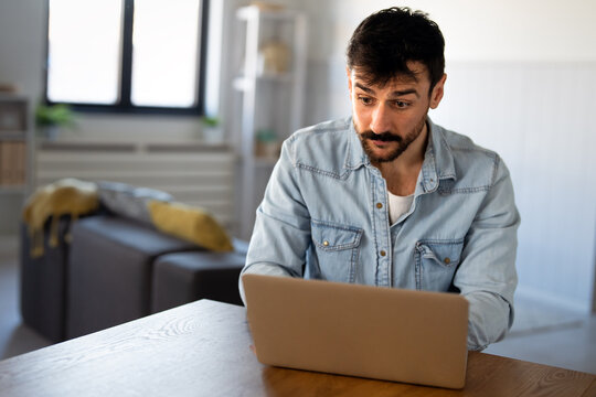 Successful male entrepreneur managing her online business from home, leading with confidence