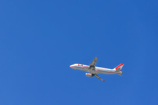 Airliner flying on a clear blue sky
