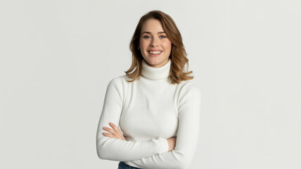 Obraz premium Confident young woman in white turtleneck