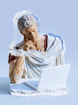 Classical marble bust statue in a thinking pose with a laptop for history education, technology evolution concepts and digital philosophy advertising with copy space