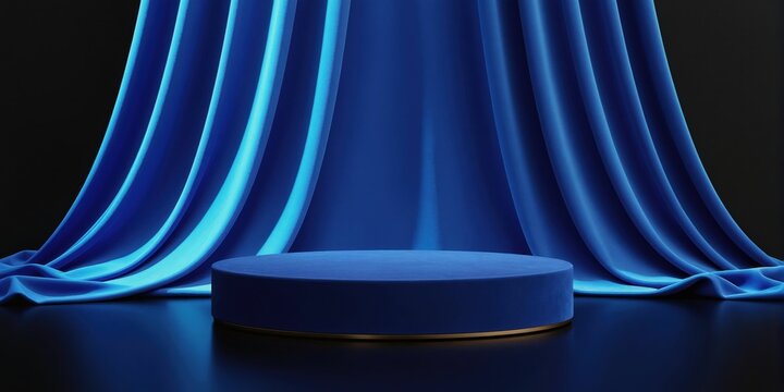 Blue velvet round podium and draped fabric on dark background for product display. Empty stage platform for presentation, advertising, or cosmetic show.