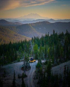 Off road truck camping in the mountains at sunset