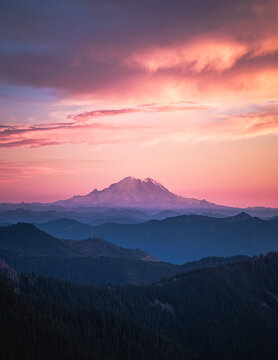 Mount Rainier glows during a beautiful pink sunset